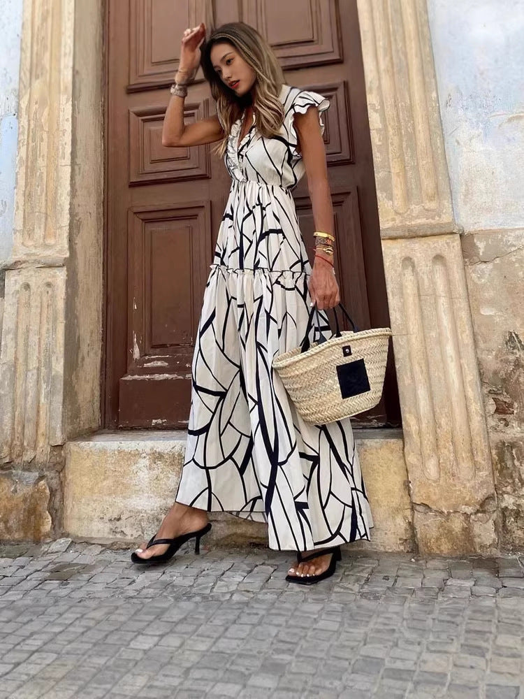 Sunset Breeze Dress frescura, elegancia y libertad en cada movimiento.
